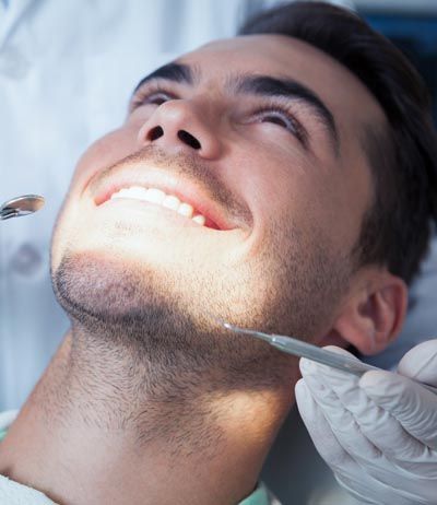 man getting dental care at Central Virginia Family Dentistry