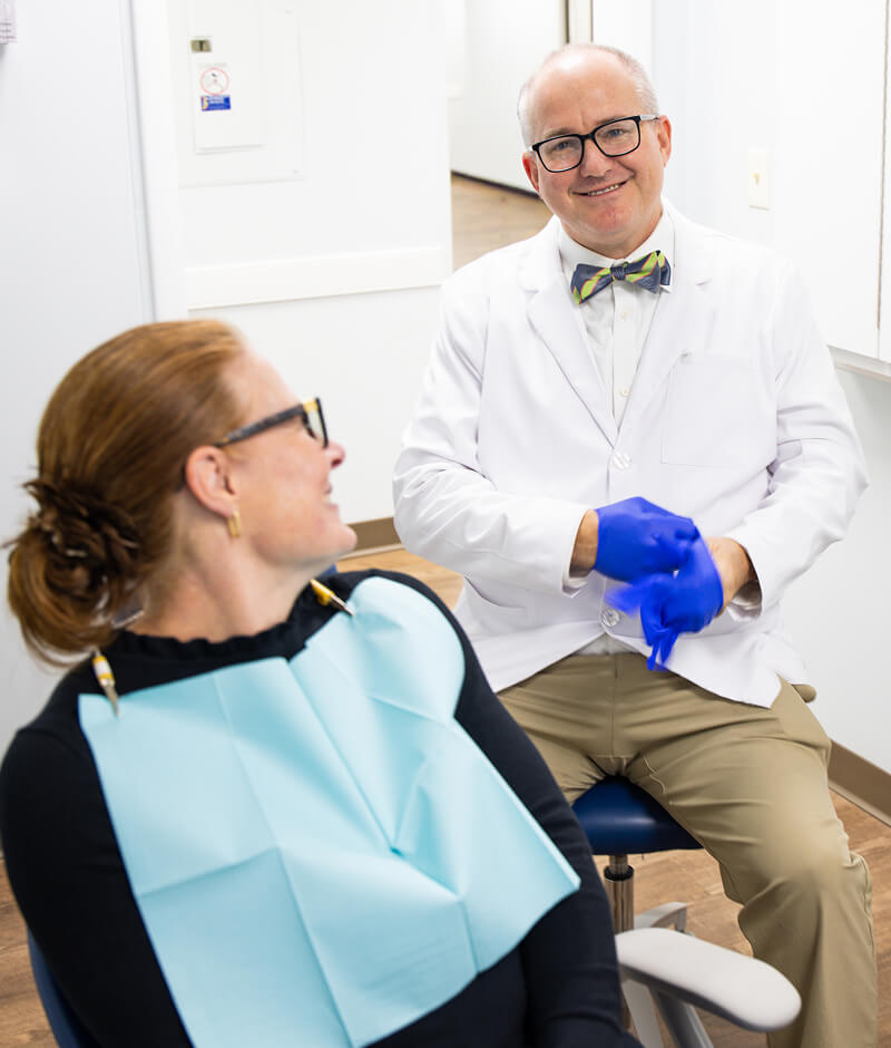 Dr. John Howard consulting a patient at Amherst dentist providing care at Central Virginia Family Dentistry